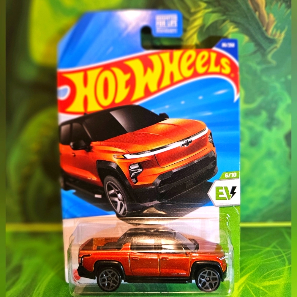 Mattel HotWheels Silverado EV RST Orange Electric Truck